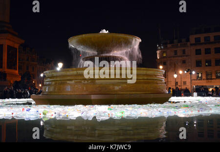 Photo Must Be Credited ©Alpha Press 066465 16/01/2016 Plastic Islands by Luzinterruptus in Trafalgar Square at the Lumiere London Light Festival. Plastic Islands is inspired by the Eighth Continent: the Garbage Patch of marine litter that accumulates in the North Pacific Ocean. It comments on the alarming rate that rubbish is swallowing large areas of the Pacific Ocean and the lack of action to tackle this problem. Made from thousands of bottles, this installation both awakens and astounds audiences with its message. Stock Photo