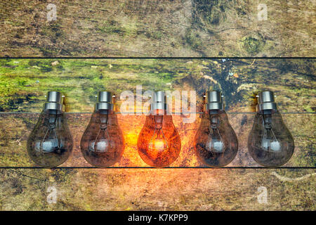 3d rendering of light bulb on wooden board Stock Photo