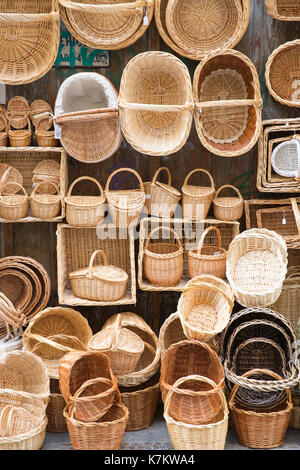 Wicker baskets as gifts and souvenirs in shop in Calle Marques del Arco, Segovia, Spain Stock Photo