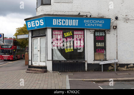 View of closed bedding shop on Hoe Street, in Walthamstow, East London. Stock Photo