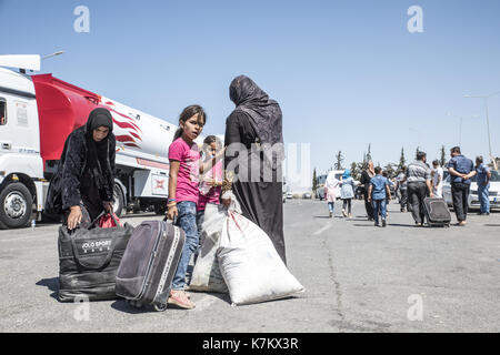 Syrian refugees (mainly from Aleppo and Idlib) entering Turkey in Kilis. Most of them will live in refugee camp. September 8, 2017; Kilis, Turkey. Stock Photo