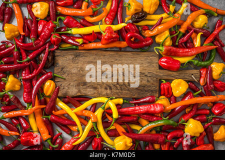 Mixed chili and hot habanero peppers. Stock Photo