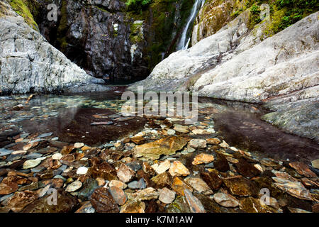 Clear pool at base of Niagara Falls - Goldstream Provincial Park - Victoria, Vancouver Island, British Columbia, Canada Stock Photo