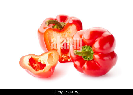 Whole and sliced bell peppers over white Stock Photo