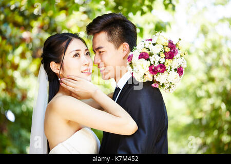 close-up portrait of loving wedding couple. Stock Photo