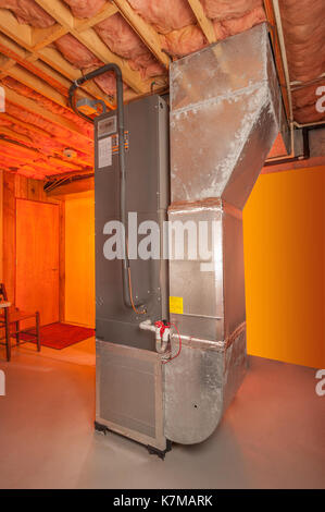 House forced hot air and air conditioning system in basement Stock Photo -  Alamy