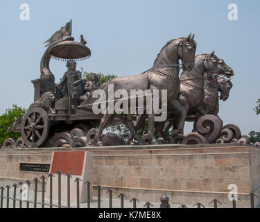 The statue of Krishna and Arjuna on the chariot, without people.  Kurukshetra, Haryana, India. Stock Photo