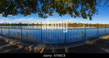 Upper West Side across Central Park Reservoir in Fall. Manhattan, New York City Stock Photo