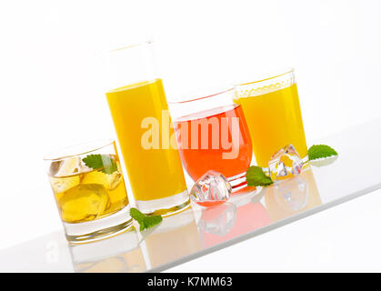 variety of fresh fruit juices on white background Stock Photo