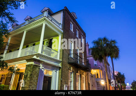 Charleston South Carolina,historic Downtown,Broad Street,dusk,night,Charleston single house,architecture,piazza,porch,SC170514257 Stock Photo