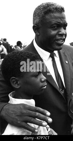 Former baseball star Jackie Robinson and his son David at the March on Washington in support of civil rights legislation, Washington, DC, 08/28/1963. Stock Photo