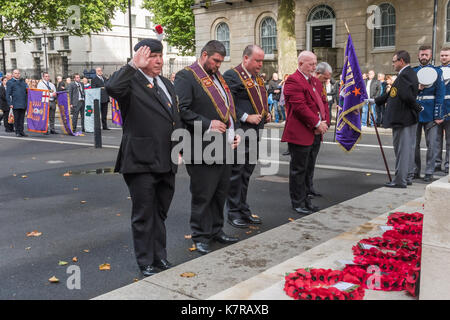 London, UK. 16th September 2017. The annual Lord Carson Memorial Parade by lodges of the Orange Order. Five men stand at the Cenotaph after laying wreaths. As well as various lodges dedicated to the Apprentice Boys of Derry there were others remembering the Ulster regiments that fought on the Somme. Some of those at the event had come from Ulster and from Scotland, as well as those from the Home Counties and London. Lord Carson became a member of the Orange Order at the age of 19, and was a leading judge and politician in the UK around the start of the 20th century, becoming Solicitor General. Stock Photo