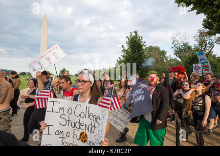 WASHINGTON, DC - September 16, 2017: Fans of the music group 'Insane Clown Posse,' called Juggalos, march in front of the Washington Monument during the Juggalo March on Washington 2017.  The group gathered in Washington, DC to protest their FBI designation as a criminal gang. Credit: Jeffrey Willey/Alamy Live News Stock Photo