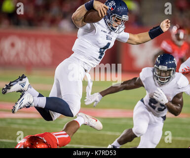 Houston, TX, USA. 16th Sep, 2017. Rice Owls quarterback Sam Glaesmann (4) leaps over a defender during the 2nd quarter of an NCAA football game between the Rice Owls and the University of Houston Cougars at TDECU Stadium in Houston, TX. Trask Smith/CSM/Alamy Live News Stock Photo