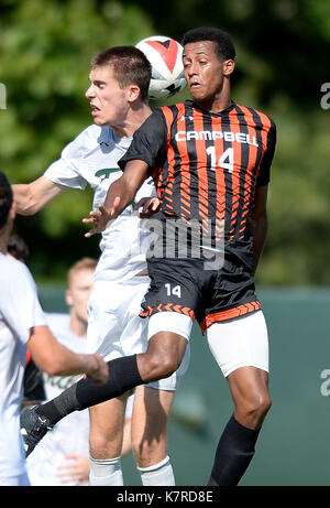 Williamsburg, VA, USA. 16th Sep, 2017. 20170916 - Campbell forward JJ DONNELLY (14) and William and Mary defender SAM GOLAN (5) battle for a head ball in the second half at Martin Family Stadium in Williamsburg, Va. Credit: Chuck Myers/ZUMA Wire/Alamy Live News Stock Photo