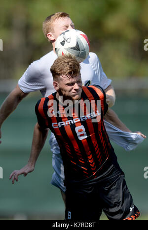 Williamsburg, VA, USA. 16th Sep, 2017. 20170916 - Campbell midfielder IAN REES (8) and William and Mary defender REMI FROST (4) battle for a head ball in the second half at Martin Family Stadium in Williamsburg, Va. Credit: Chuck Myers/ZUMA Wire/Alamy Live News Stock Photo