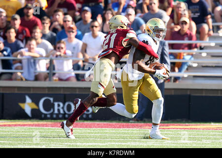 Alumni Stadium. 16th Sep, 2017. MA, USA; Boston College Eagles defensive back Lukas Denis (21) tackles Notre Dame Fighting Irish tight end Alize Mack (86) during the first half of the NCAA football game between Notre Dame Fighting Irish and Boston College Eagles at Alumni Stadium. Notre Dame defeated Boston College 49-20. Anthony Nesmith/CSM/Alamy Live News Stock Photo