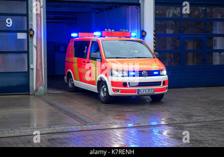 Hanover, Germany. 11th Aug, 2017. An ambulance with blue lights flashing leaving a garage at the Feuer- und Rettungswache 3 (lit. fire and ambulance station 3) in Hanover, Germany, 11 August 2017. Photo: Silas Stein/dpa/Alamy Live News Stock Photo