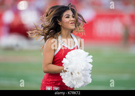 Houston, TX, USA. 16th Sep, 2017. A member of the Cougar Dolls dance team performs prior to an NCAA football game between the Rice Owls and the University of Houston Cougars at TDECU Stadium in Houston, TX. Houston won the game 38-3.Trask Smith/CSM/Alamy Live News Stock Photo