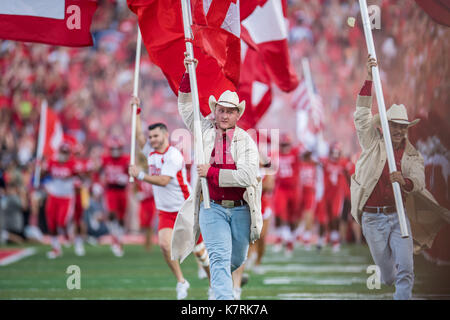 Houston, TX, USA. 16th Sep, 2017. The Houston Cougars Frontiersmen enter the field prior to an NCAA football game between the Rice Owls and the University of Houston Cougars at TDECU Stadium in Houston, TX. Houston won the game 38-3.Trask Smith/CSM/Alamy Live News Stock Photo