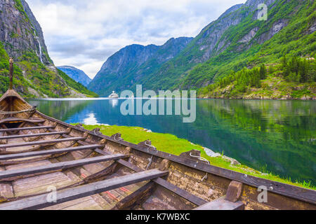 Viking boat and a ferry in the Naeroyfjord, shore of Gudvangen, Norway, Scandinavia Stock Photo