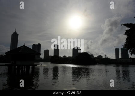 Sun setting over the Seema Malaka Temple ( Simamalaka Shrine), situated on a small island on Lake Beira and close to the Sir James Pieris Mawatha in C Stock Photo