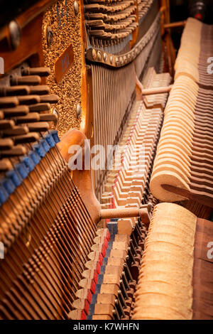 Inside old piano view. Ancient musical mechanism close up Stock Photo