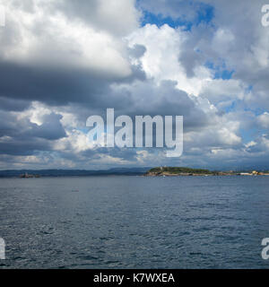 Lighthouse on Mouro Island in the Bay of Santander Stock Photo