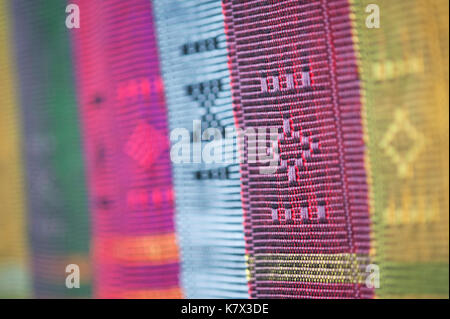 Close up detail of colourful Thai traditionally weaved scarves Stock Photo