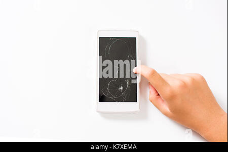 Girl using a phone with broken screen Stock Photo