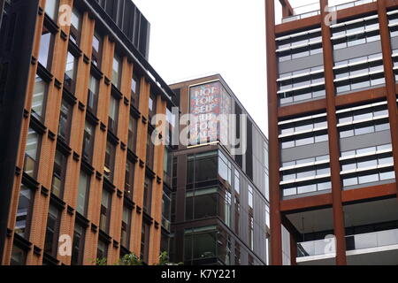 An artwork saying Not For Self But For All on Google offices, Pancras Square, Kings Cross, London Stock Photo