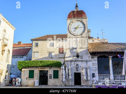 Clock on the tower of the main square of Trogir. Stock Photo