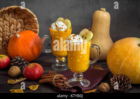 Apple Cider Floats with caramel sauce and pumpkin pie spices. Homemade Autumn Apple Cider Floats with special fall ingredients for Thanksgiving. Stock Photo