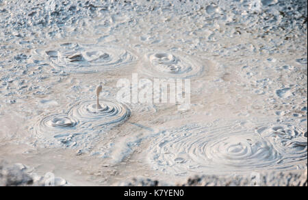 Yellowstone National Park, WY, USA 22nd August 2015. Bubbling mud on Artists paint pots hot spring, geothermal features expelling gases from the earth Stock Photo