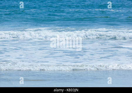 Beautiful waves roll and crash along the shore at Sea Girt beach in New Jersey. Stock Photo