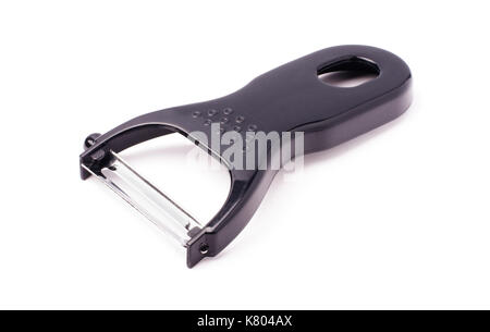 Black plastic vegetable peeler isolated on white background Stock Photo