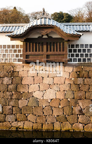 Japan, Kanazawa castle. Reconstructed to it's 1850's appearance, Taiko-bei wall, with dashi window, used as stone dropping hole. Stock Photo