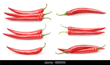Isolated peppers collection. Piles of red hot peppers isolated on white background with clipping path Stock Photo