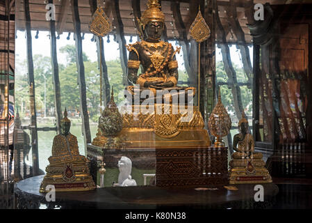 The replica figure of the Lord Buddha. It is  made of Jade  enclosed in a glass cabinet in the main hall or shrine at the Seema Malakaya Temple Stock Photo