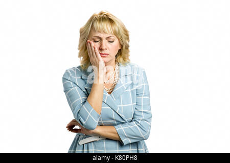 Middle aged woman suffering from toothache. Stock Photo