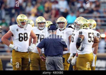 Alumni Stadium. 16th Sep, 2017. MA, USA; Notre Dame Fighting Irish players huddle during the second half of the NCAA football game between Notre Dame Fighting Irish and Boston College Eagles at Alumni Stadium. Notre Dame defeated Boston College 49-20. Anthony Nesmith/CSM/Alamy Live News Stock Photo