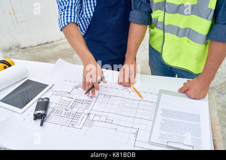 Working Meeting at Construction Site Stock Photo