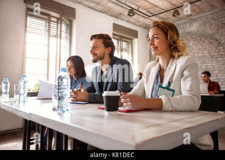 Working team with female and male persons in company on job Stock Photo