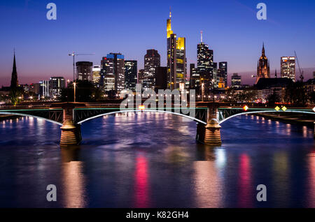 Frankfurt am Main, Hessen, Germany - April 6, 2017: Frankfurt am Main city skyline during blue hour in Frankfurt, Germany Stock Photo