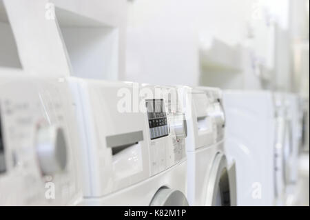 washing machines in appliance store Stock Photo