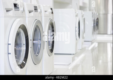 washing machines in appliance store Stock Photo