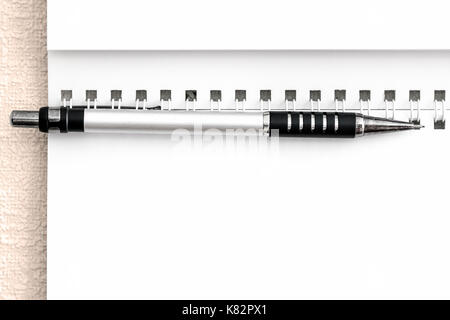Blank sheet of notepad and the black mechanical pencil closeup. Stock Photo