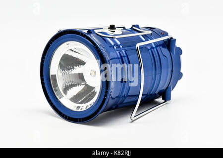blue multifunction rechargeable flashlight isolated with white background Stock Photo