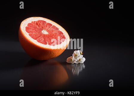 Grapefruit isolated on a black background Stock Photo