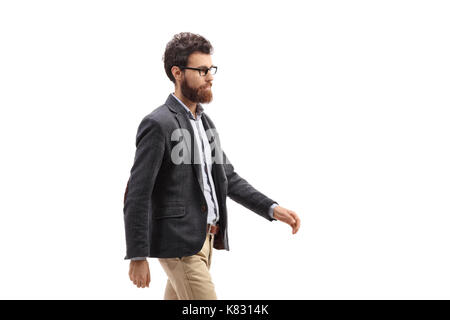 Young bearded man walking isolated on white background Stock Photo
